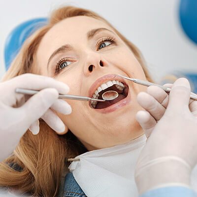 Closeup of Woman Having Tooth Work Done