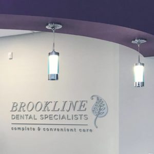 Brookline Dental Specialists Logo on a wall 