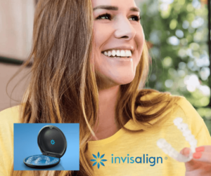Smiling woman holding Invisalign piece in her hand 