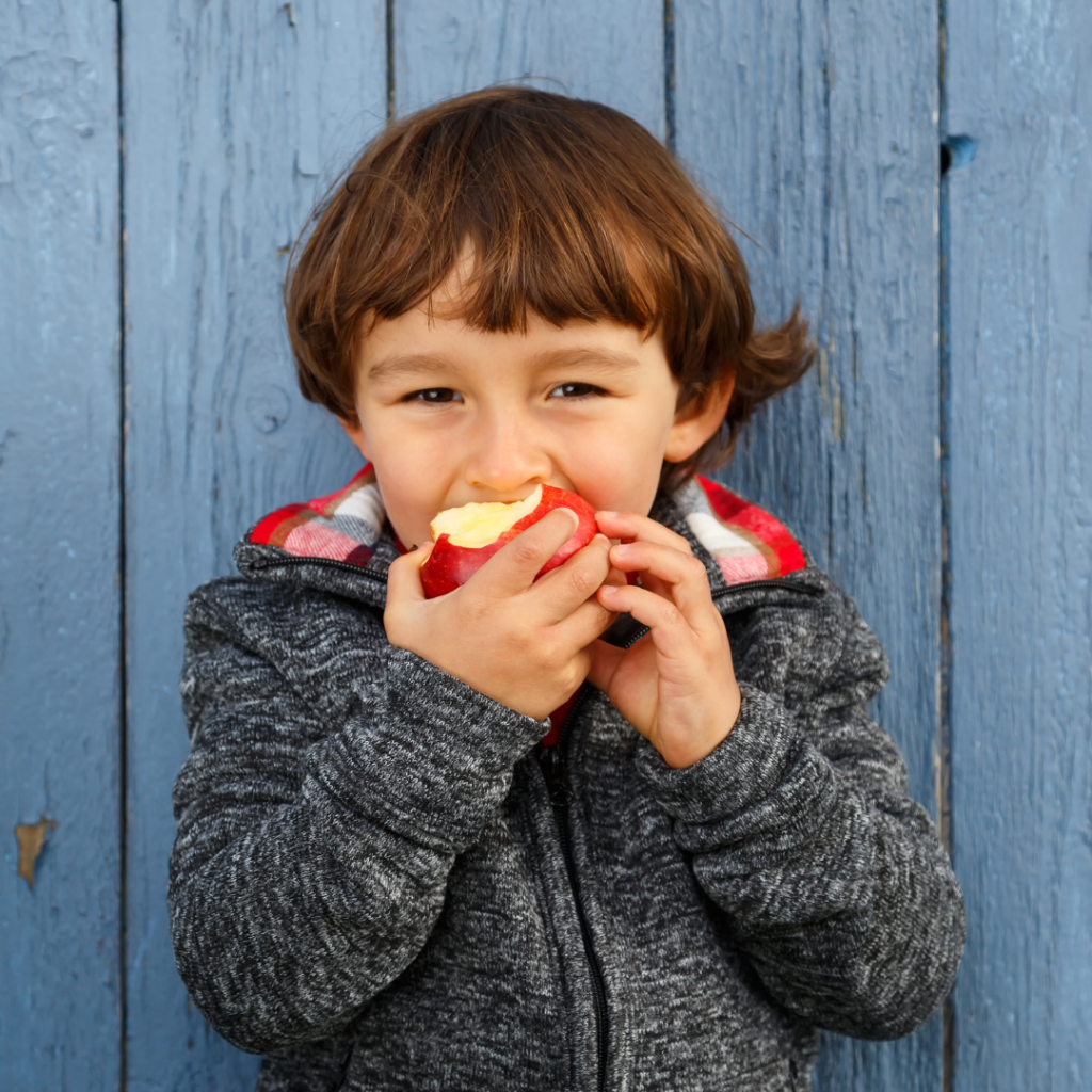 Child eating an apple